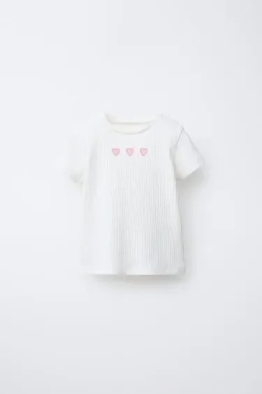 Футболка в рубчик с вырезами в виде сердец- Заказать в России