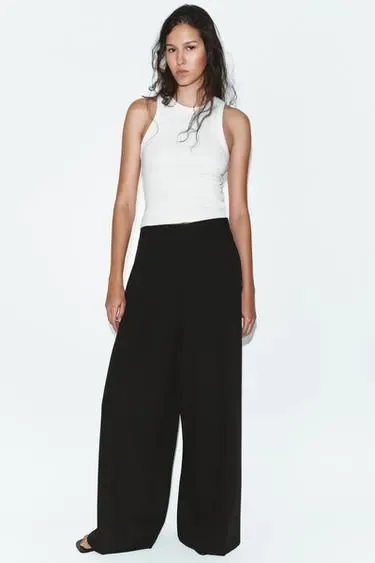 Брюки со складками