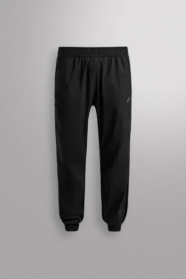 Zara Брюки-джоггеры из высокотехнологичной ткани купить с доставкой.