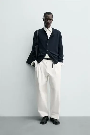 Брюки свободного кроя со складками- Заказать в России
