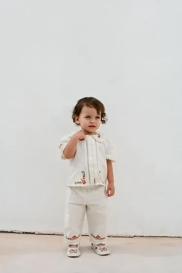 Брюки с вышивкой