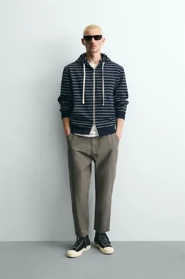 Брюки с эффектом потертости