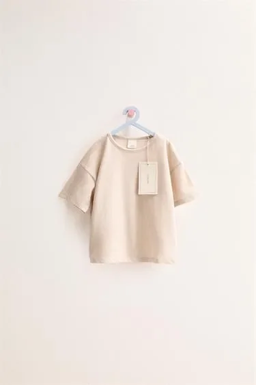Zara «Timeless» — однотонная футболка из хлопка и льна- Заказать в России