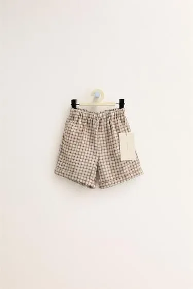 Zara ZARA «TIMELESS» - шорты в клетку из сирсекера купить с доставкой.