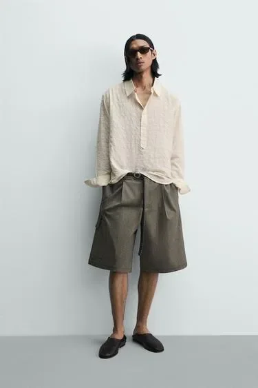 Поло JACQUARD в клетку с жатым эффектом