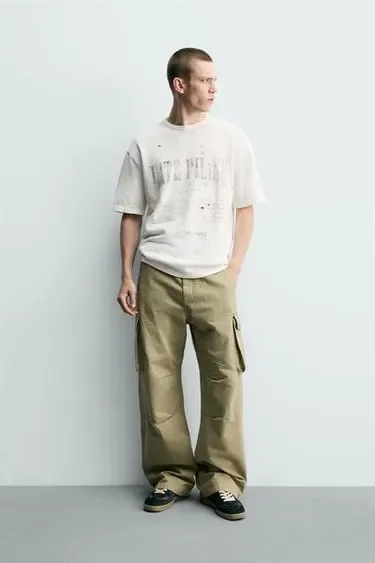 Zara Футболка с принтом и эффектом потертости купить с доставкой.