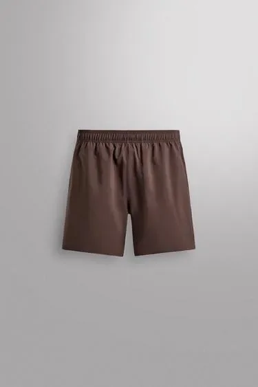 Zara Спортивные шорты 9” купить с доставкой.