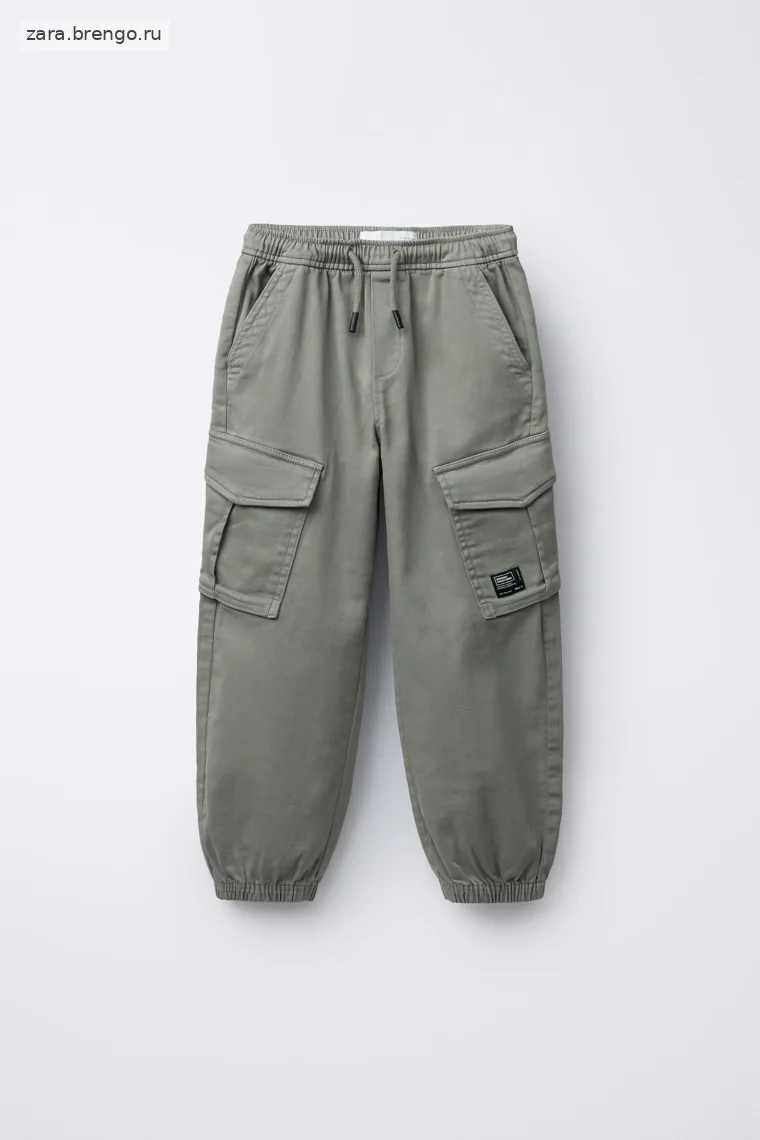 Брюки-джоггеры с карманами, лейблом и завязками