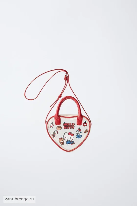 СУМКА С ПЛЕЧЕВЫМ РЕМНЕМ В ФОРМЕ СЕРДЦА HELLO KITTY © SANRIO