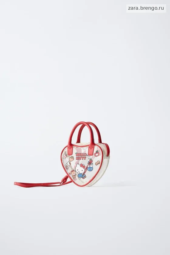 СУМКА С ПЛЕЧЕВЫМ РЕМНЕМ В ФОРМЕ СЕРДЦА HELLO KITTY © SANRIO