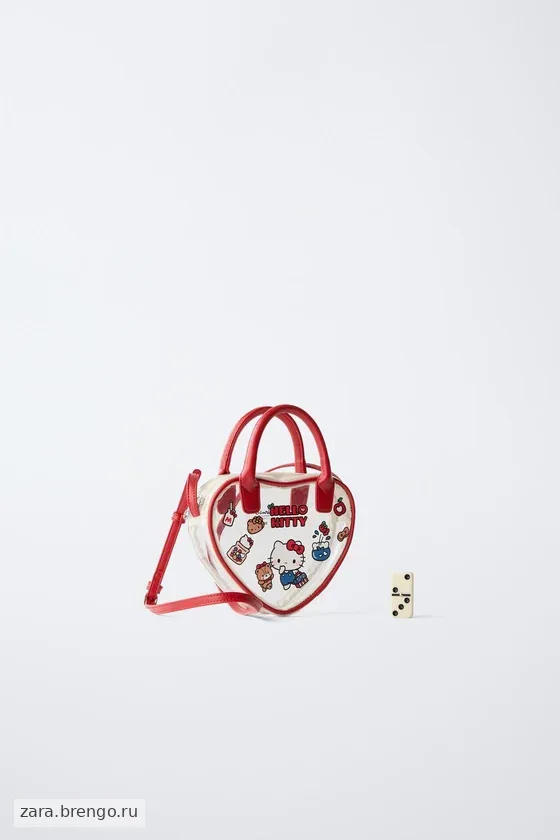 СУМКА С ПЛЕЧЕВЫМ РЕМНЕМ В ФОРМЕ СЕРДЦА HELLO KITTY © SANRIO