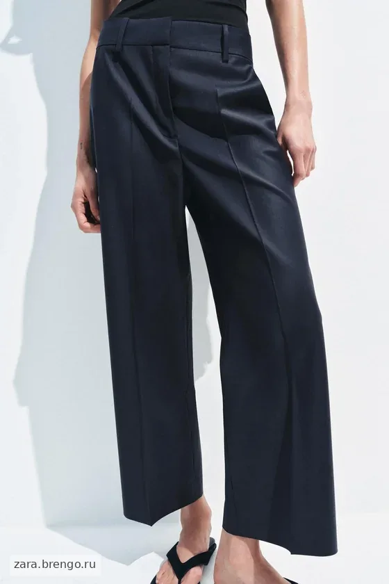 БРЮКИ ИЗ СМЕСОВОЙ ШЕРСТИ С ЗАУТЮЖЕННЫМИ СТРЕЛКАМИ — коллекция Zara «ZW»