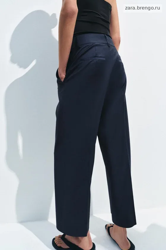 БРЮКИ ИЗ СМЕСОВОЙ ШЕРСТИ С ЗАУТЮЖЕННЫМИ СТРЕЛКАМИ — коллекция Zara «ZW»