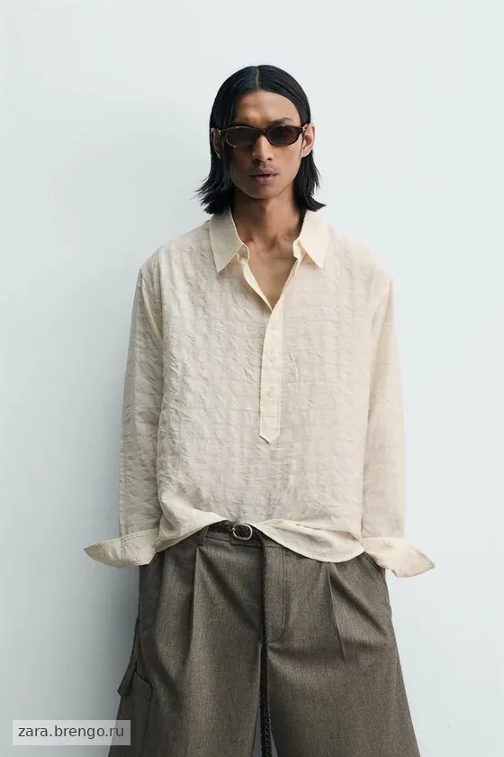 ПОЛО JACQUARD В КЛЕТКУ С ЖАТЫМ ЭФФЕКТОМ