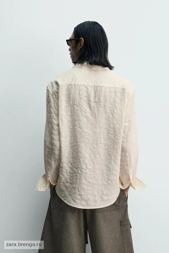 ПОЛО JACQUARD В КЛЕТКУ С ЖАТЫМ ЭФФЕКТОМ