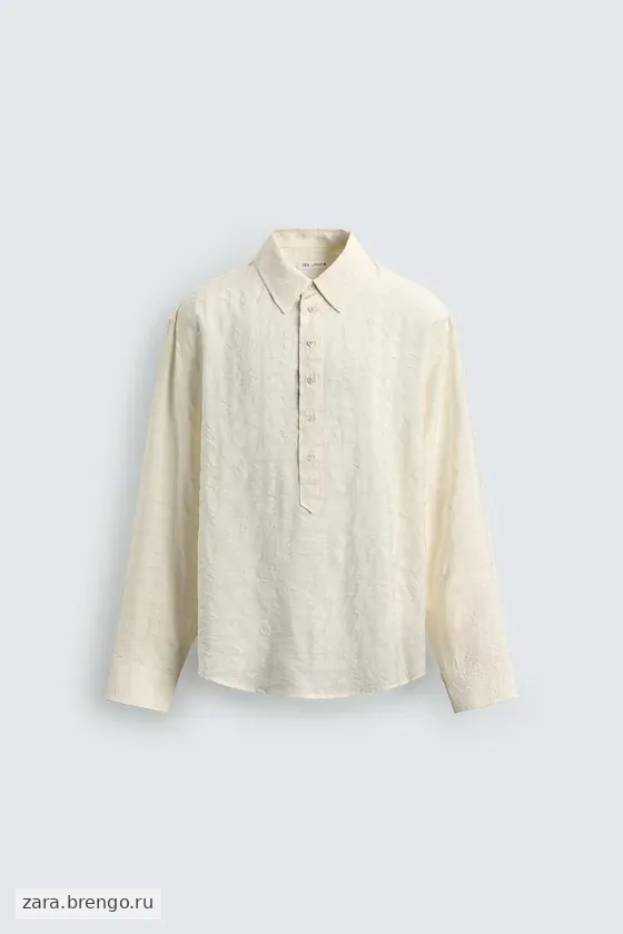 ПОЛО JACQUARD В КЛЕТКУ С ЖАТЫМ ЭФФЕКТОМ