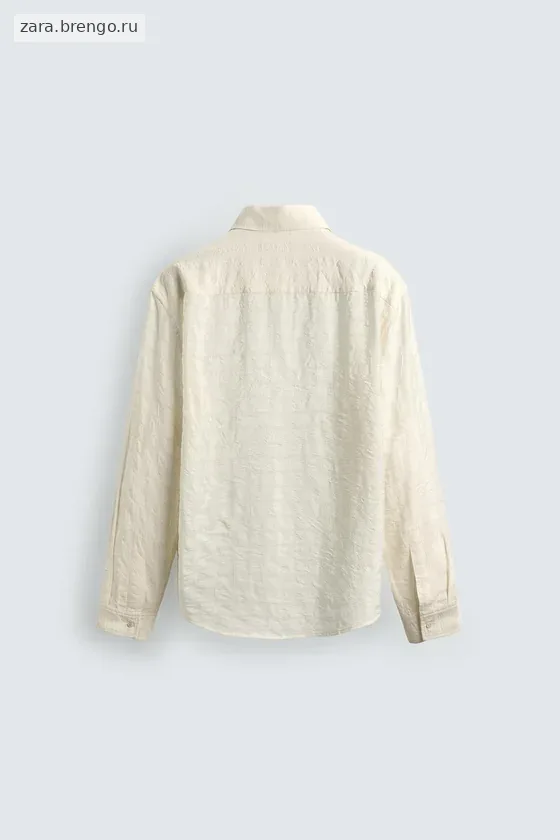 ПОЛО JACQUARD В КЛЕТКУ С ЖАТЫМ ЭФФЕКТОМ