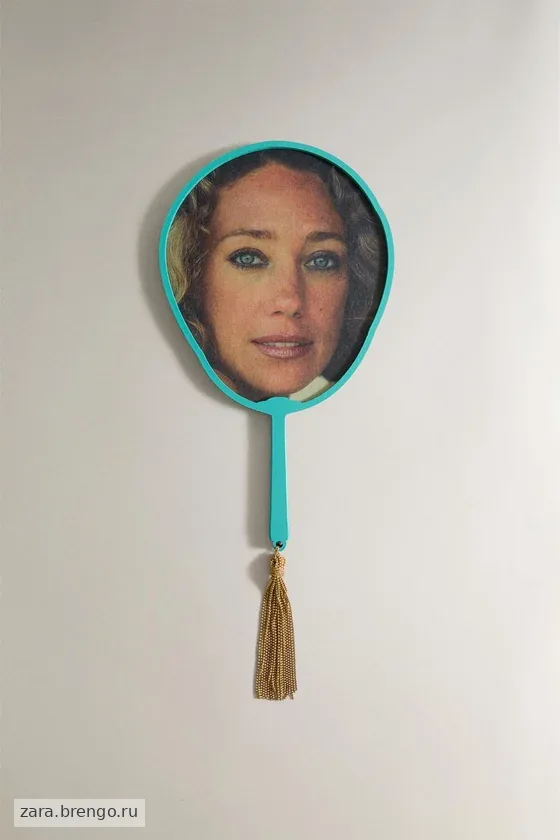 Веер из бумаги с изображением лица marisa berenson